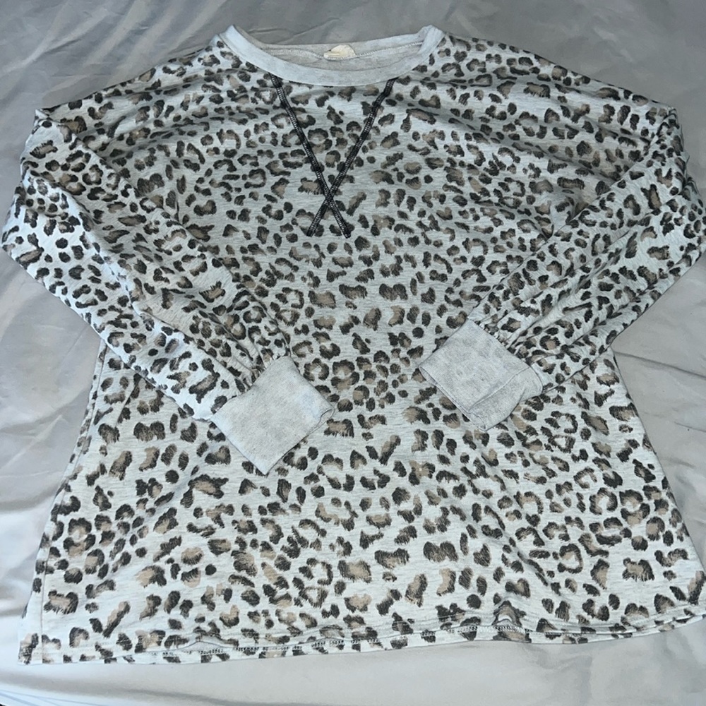 Beautiful long sleeve cheetah print women’s top. Like new. Worn twice